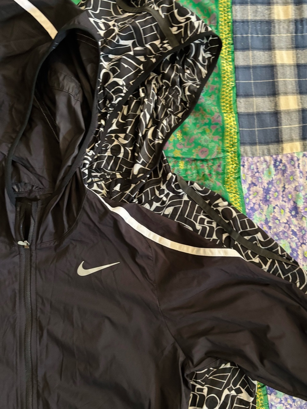 Two NIKE impossibly light packable jackets